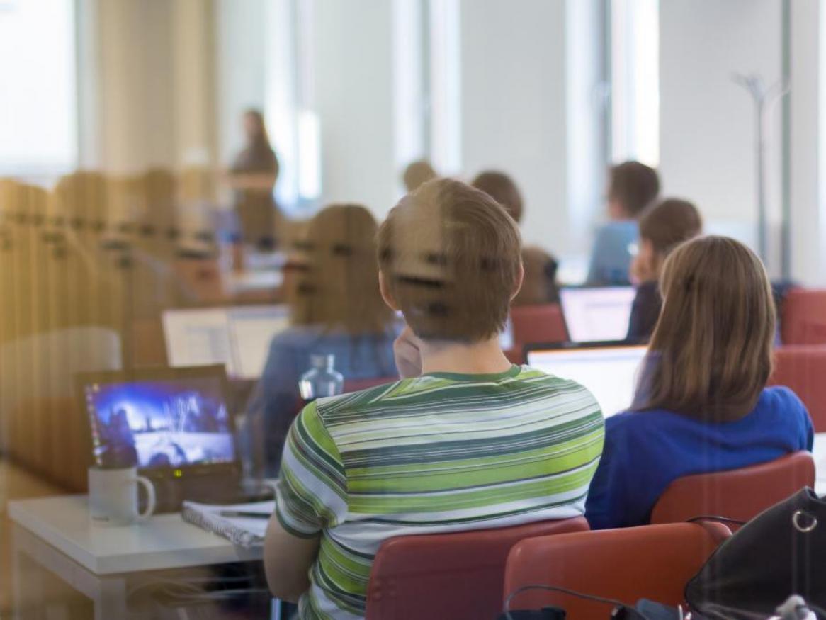 Rear view of students in a classroom