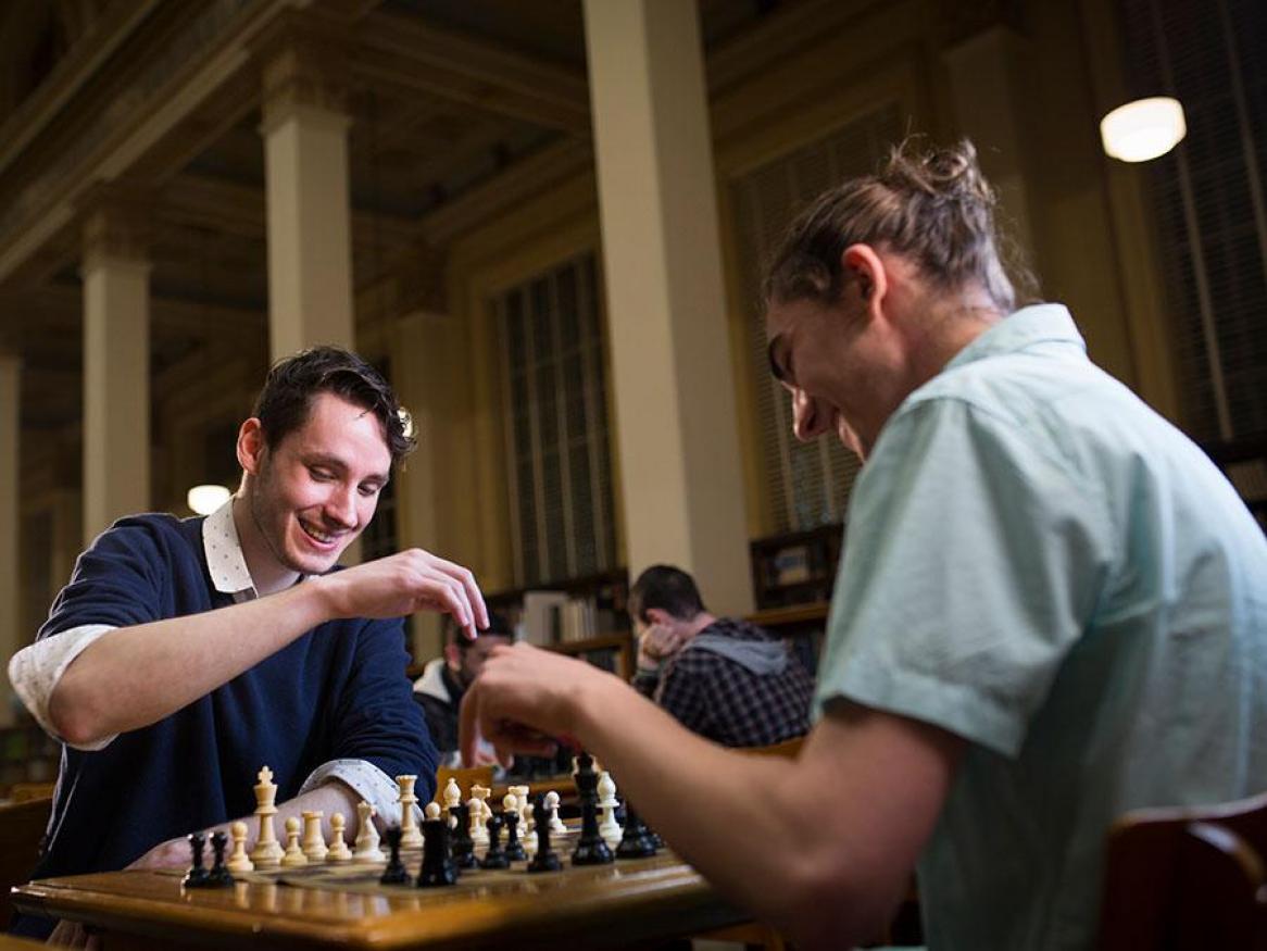 Students playing chess